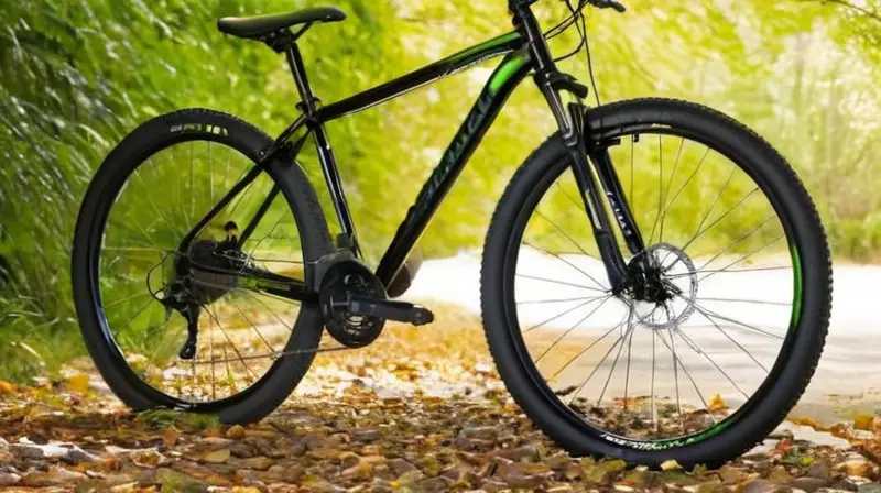 Bicicleta de montaña de 27.5 pulgadas con marco de aluminio negro mate y detalles verdes